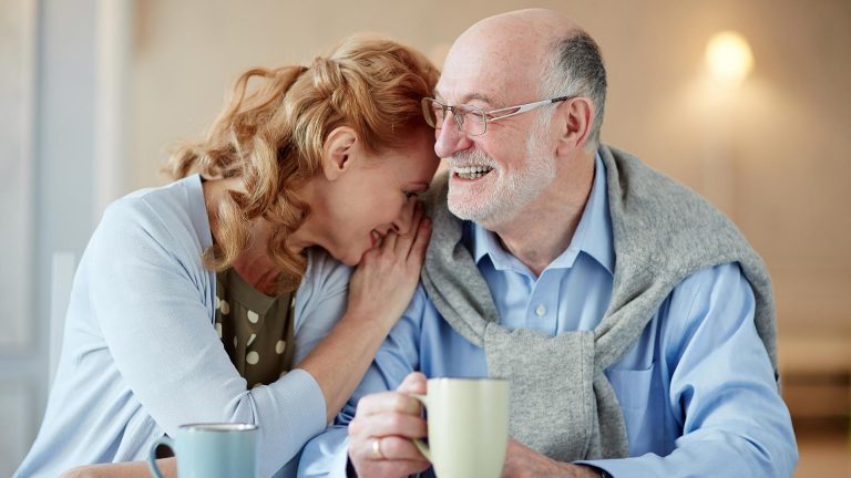 Father and daughter having coffee together